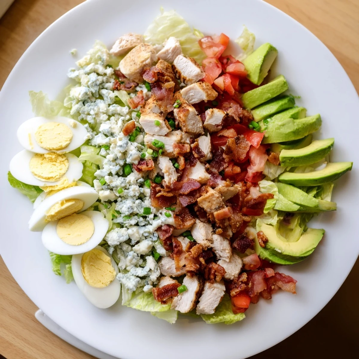 Beautiful Cobb salad, brimming with crisp greens, grilled chicken, and creamy avocado, ready to serve.