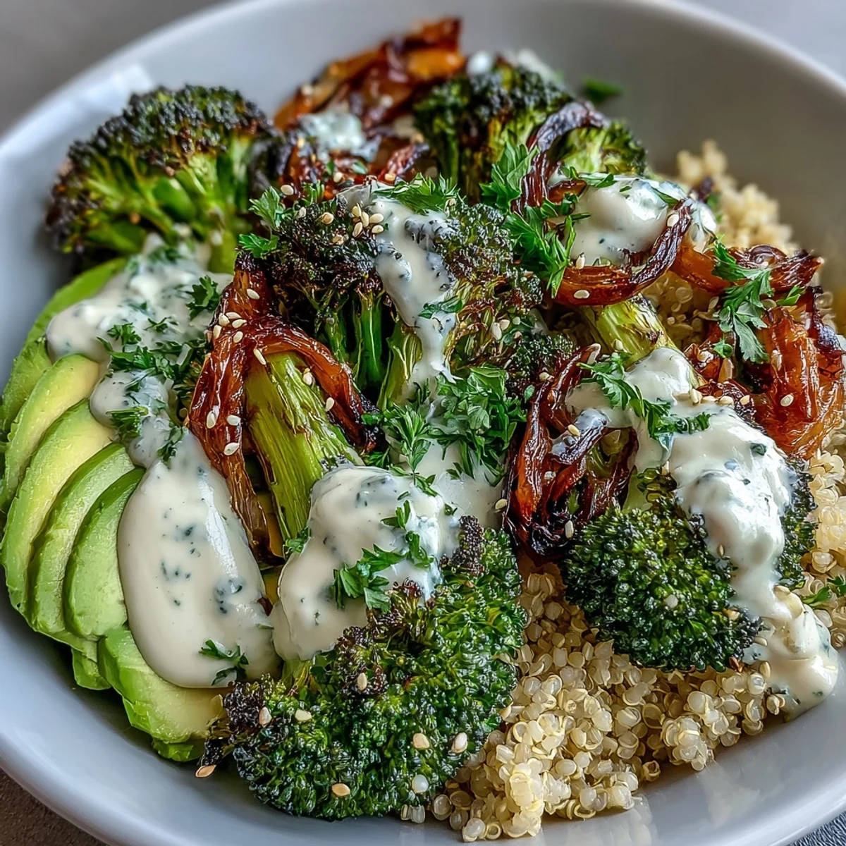 Vibrant roasted broccoli bowl with crispy florets, hearty grains, and creamy tahini drizzle, perfect for a healthy vegetarian lunch.