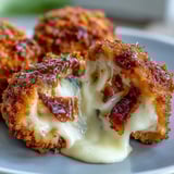 Garnished with fresh parsley and a side of creamy ranch dip, perfect for game day appetizers.